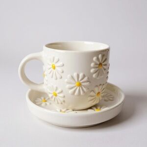 Daisy Embossed Cream and Yellow Mug and Saucer Set